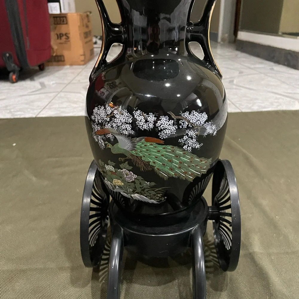 Elegant Black Floral Vase with Stand the card has a broken bar but it doesn’t
